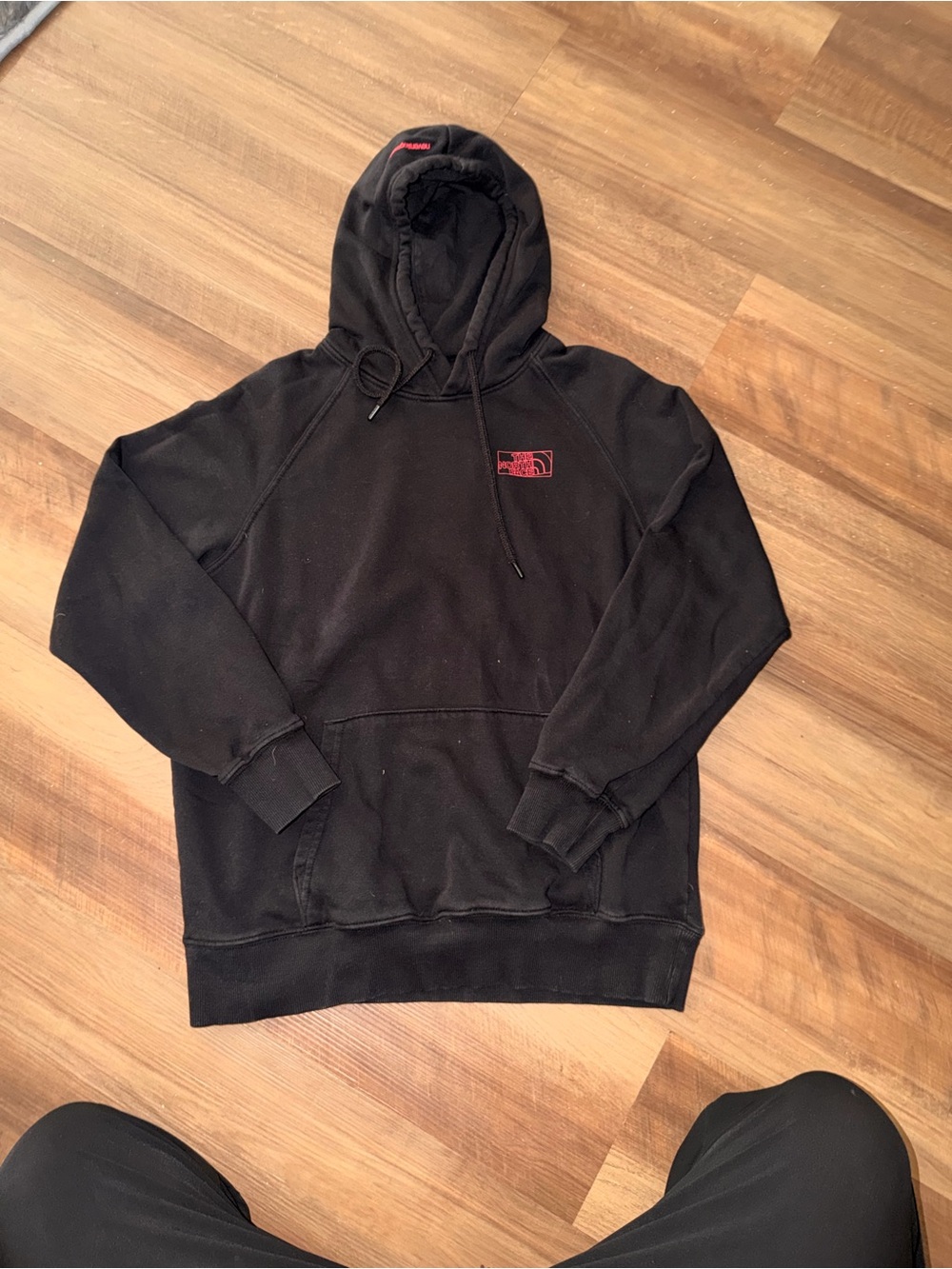 The North Face Black Hoodie with Red Logo - Men's Pullover